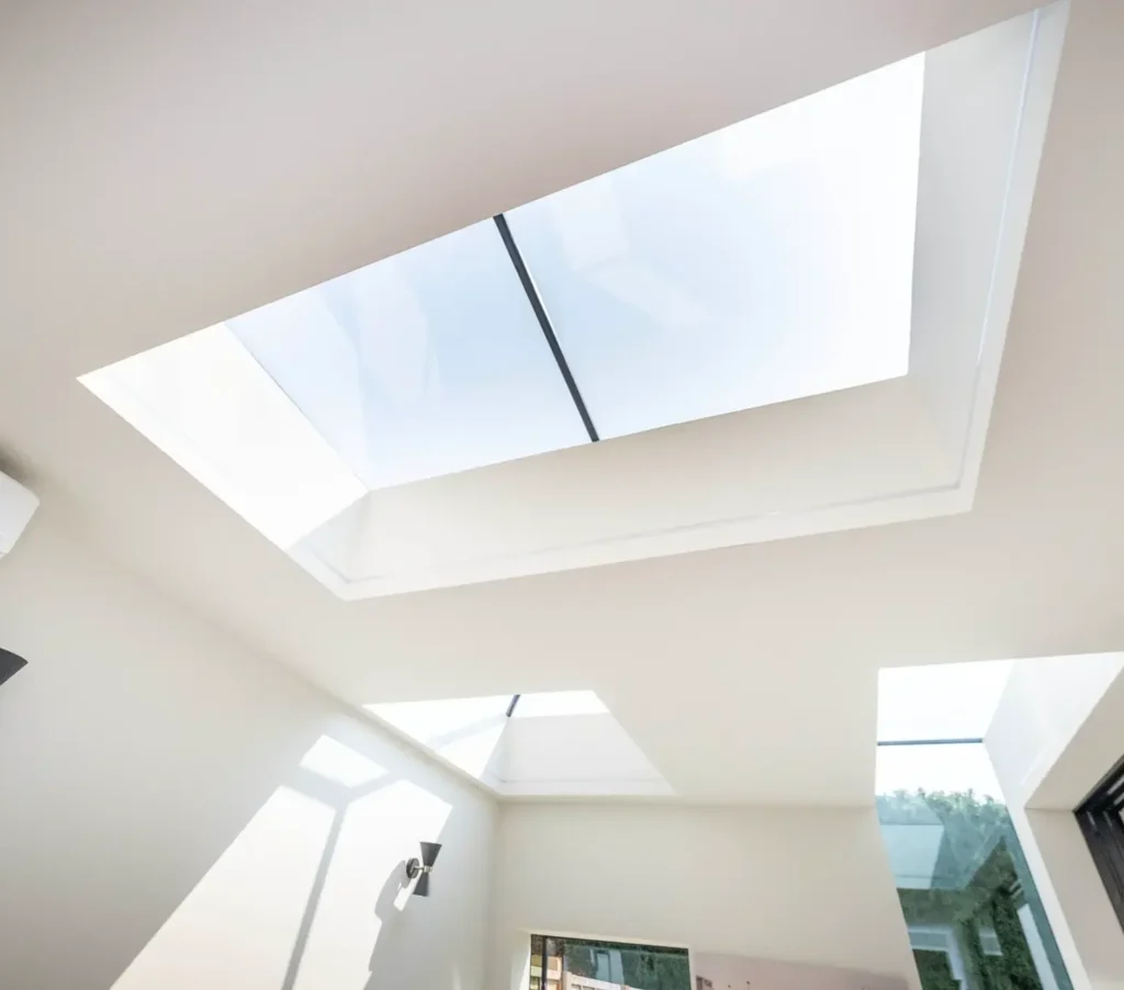 A glass lightwell bringing in natural light in a modern home extention.